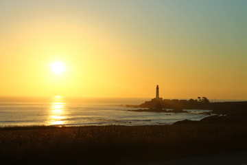 Fototapeta premium The sunset with the lighthouse