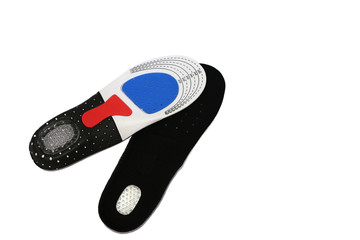 Slipsoles. Orthopedic insoles on a white background. Black insoles for shoes isolated