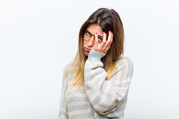 young pretty woman feeling bored, frustrated and sleepy after a tiresome, dull and tedious task,...