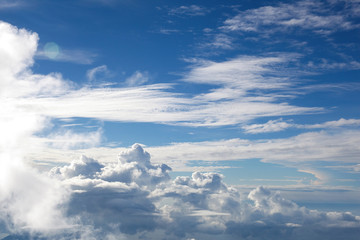 Fototapeta premium Above the clouds. In the air. Cloudy background