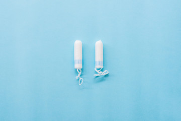 tampons on blue background