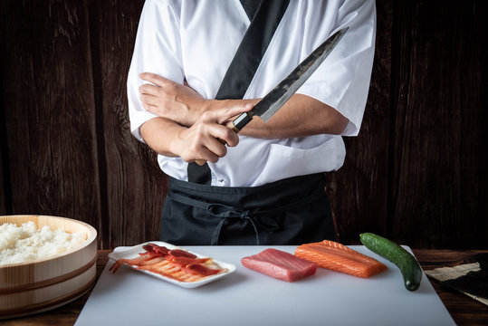 japanese sushi chef image with raw fish
