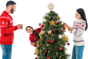 happy family decorating christmas tree isolated on white