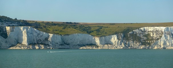 View at white cliffs of Dover, grass, trees and rocks