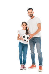 happy father and daughter holding football isolated on white