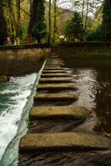 stone bridge used to pass over lak