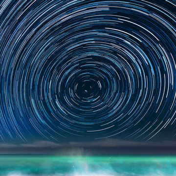 Star-trails above the Caribbean sea, in Jamaica, with the Northern Star in the center of the image.