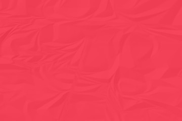 crumpled red paper background close up