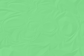 crumpled green paper background close up