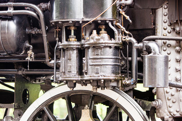 Fototapeta premium steam engine train wheel and engine mechanics