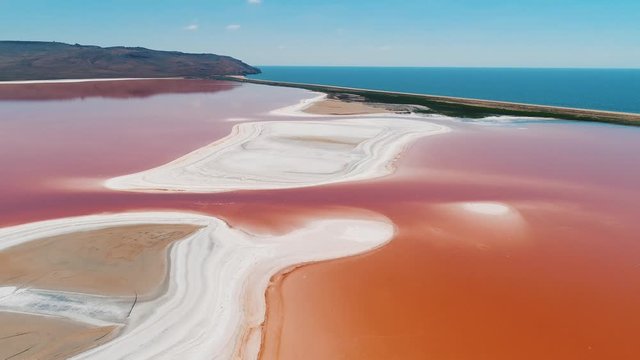 Beautiful aerial view of Laguna Colorada or Red Lake, a shallow salt lake in the southwest of the Altiplano of Bolivia. Shot. Eduardo Avaroa andean fauna National Reserve