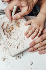 Skeleton and archaeological tools.Training for dig fossil.Simulated same as real digging. Archaeological tools, Archeaologist working on site, close-up, hand and tool. © Ekaterina