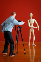 Wooden Human Mannequin Figure Model posing for photographer