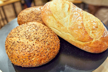 healthy fresh Various cereal bread, on blue background