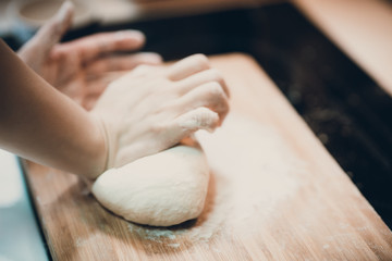Woman prepare dumpling skin, Making dough  on wooden table
