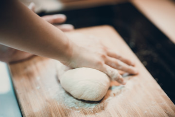 Woman prepare dumpling skin, Making dough  on wooden table