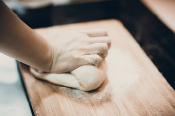 Woman prepare dumpling skin, Making dough  on wooden table