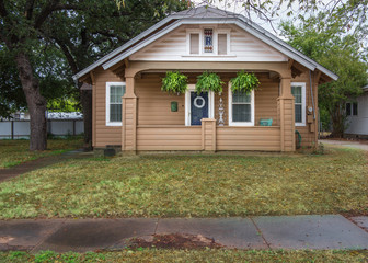 beautiful brown wood house green plants grass