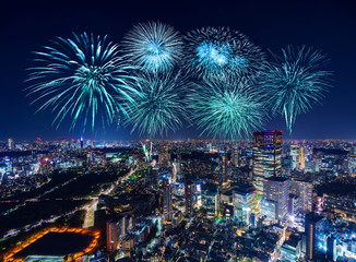 Fototapeta premium Fireworks over Tokyo cityscape at night, Japan