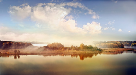 Panoramic autumn landscape of water body