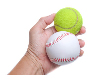 baseball and tenis ball on hand isolated white background