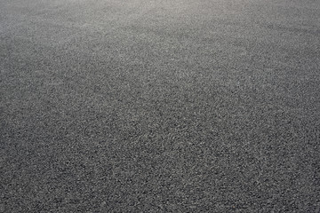 Wide black asphalt road texture background