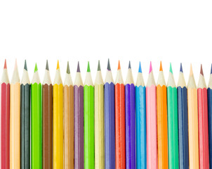 Color pencils stacking isolated on the white background.