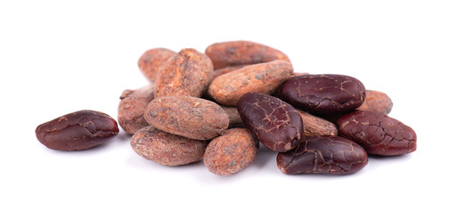 Obraz premium Unpeeled and peeled cacao beans, isolated on white background. Roasted and aromatic cocoa beans, natural chocolate.