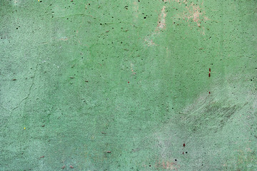 Texture of a concrete wall with cracks and scratches which can be used as a background