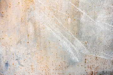 Metal texture with scratches and cracks which can be used as a background