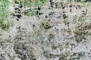 Texture of a concrete wall with cracks and scratches which can be used as a background