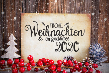 Fototapeta na wymiar Paper With German Text Frohe Weihnachten Und Ein Glueckliches 2020 Means Merry Christmas And A Happy 2020 Christmas Decoration And Wooden Background With Snow