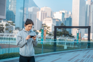 Woman playing mobile game  outdoor