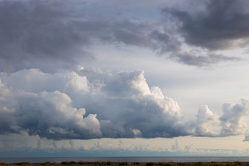 Fototapeta na wymiar Rain cloud. The sky before the rain, gloomy heavy clouds. Natural background