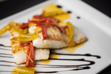 hake fish dish with peppers