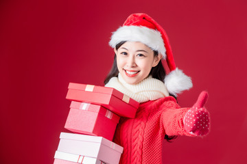 asian woman hold christmas gifts