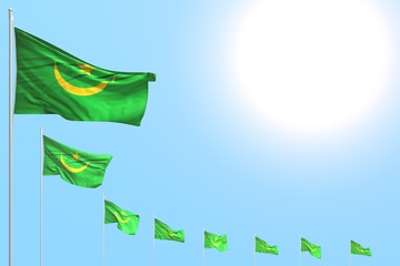 cute day of flag 3d illustration. - many Mauritania flags placed diagonal on blue sky with space for text