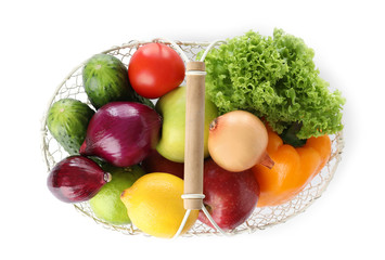 Basket of fresh fruits and vegetables isolated on white, flat lay