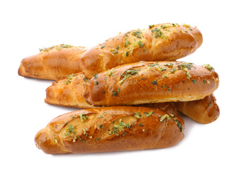 Bread loaves with garlic and herbs on white background