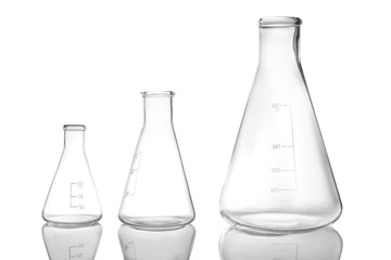 Empty conical flasks on white background. Laboratory glassware