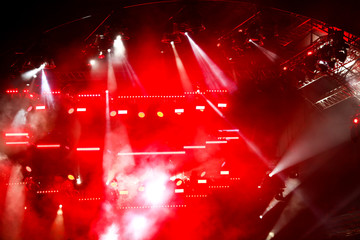 Red light on a rock concert stage as background