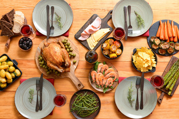 Table set for big family dinner, top view