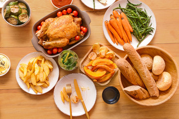Table set for big family dinner, top view