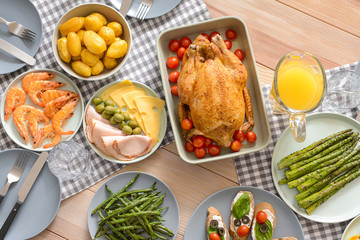 Table set for big family dinner, top view