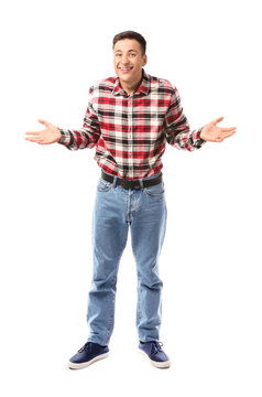 Portrait of handsome carefree young man on white background