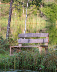 Wooden bench on the lake