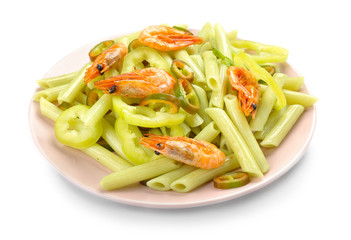 Plate with tasty pasta and shrimps on white background