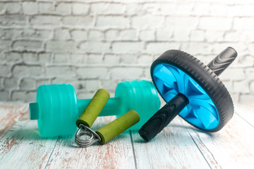 Fitness Equipment on Wooden Background. Shallow depth of field