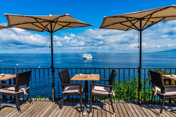 A cruise ship in the bay of naples viewed from Sorrento. Mount Vesuvius just to the right