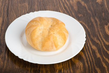 bun baking on a white plate or in a transparent bag on a white background